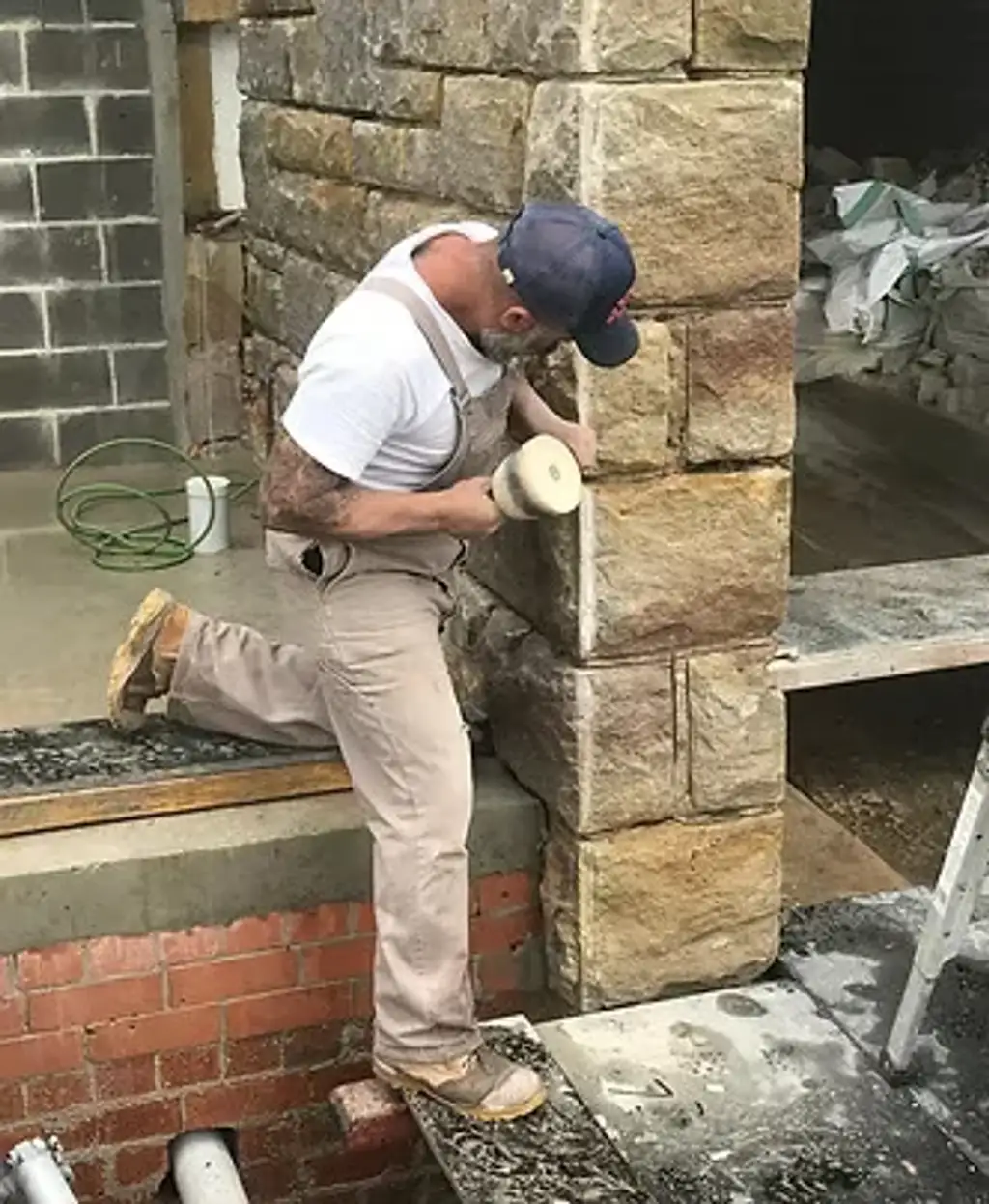 Minas Romanakis of Roman Building Services on site